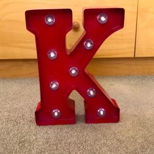 Metal sign. Letter “K”